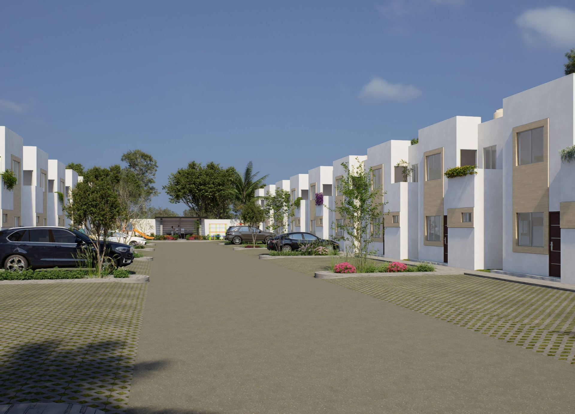Calle interior del conjunto con casas de dos pisos y estacionamientos